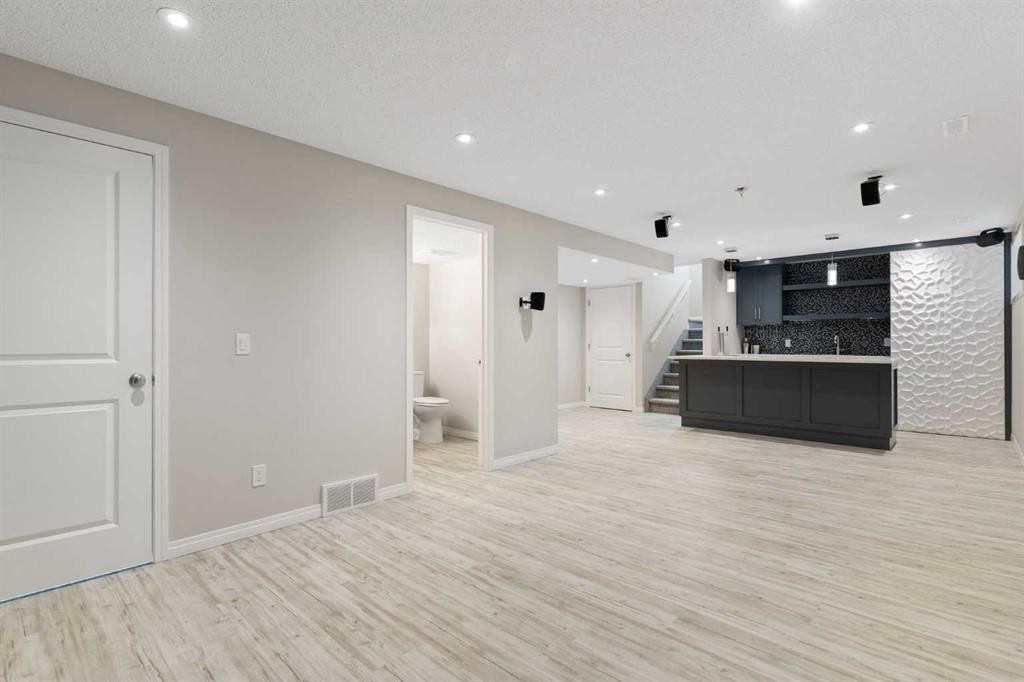 16 Fireside Way, Cochrane, AB - Indoor Photo Showing Other Room