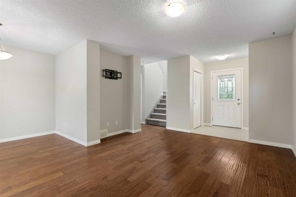 16 Fireside Way, Cochrane, AB - Indoor Photo Showing Other Room