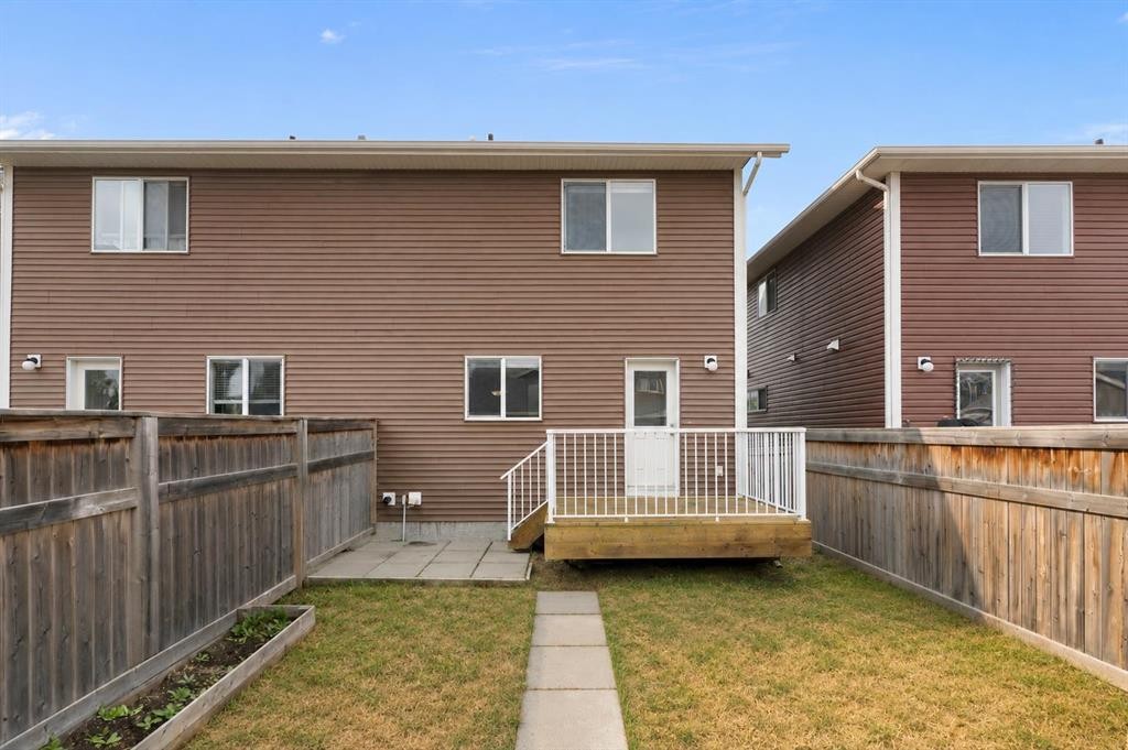 16 Fireside Way, Cochrane, AB - Outdoor With Deck Patio Veranda With Exterior