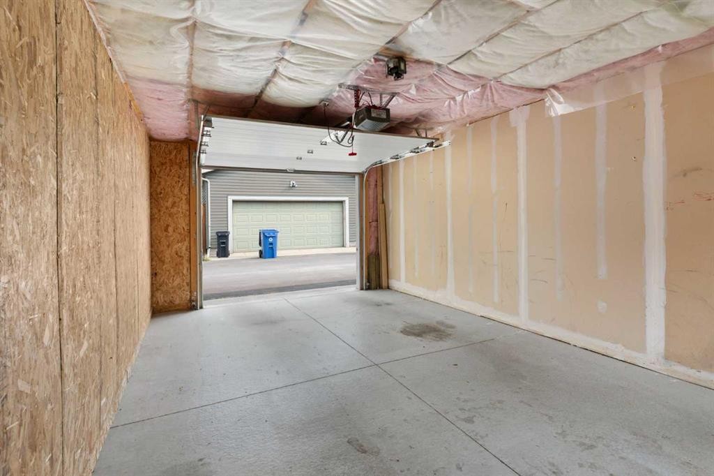 16 Fireside Way, Cochrane, AB - Indoor Photo Showing Other Room