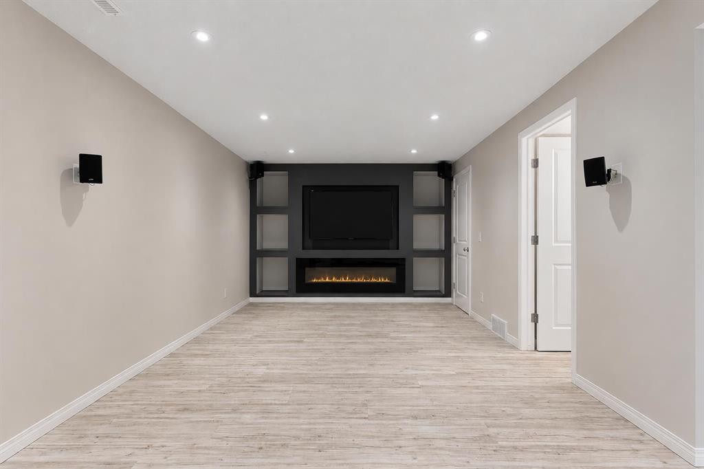 16 Fireside Way, Cochrane, AB - Indoor Photo Showing Other Room