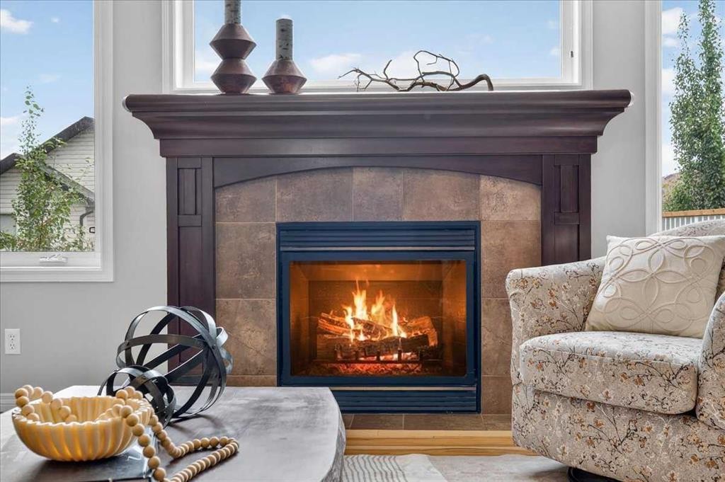 174 Cranridge Terrace Se, Calgary, AB - Indoor Photo Showing Living Room With Fireplace