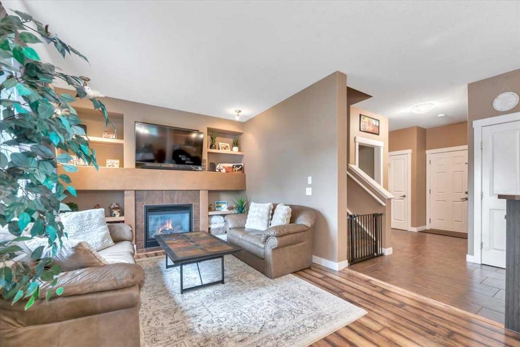 331 Ranch Ridge Meadow, Strathmore, AB - Indoor Photo Showing Living Room With Fireplace