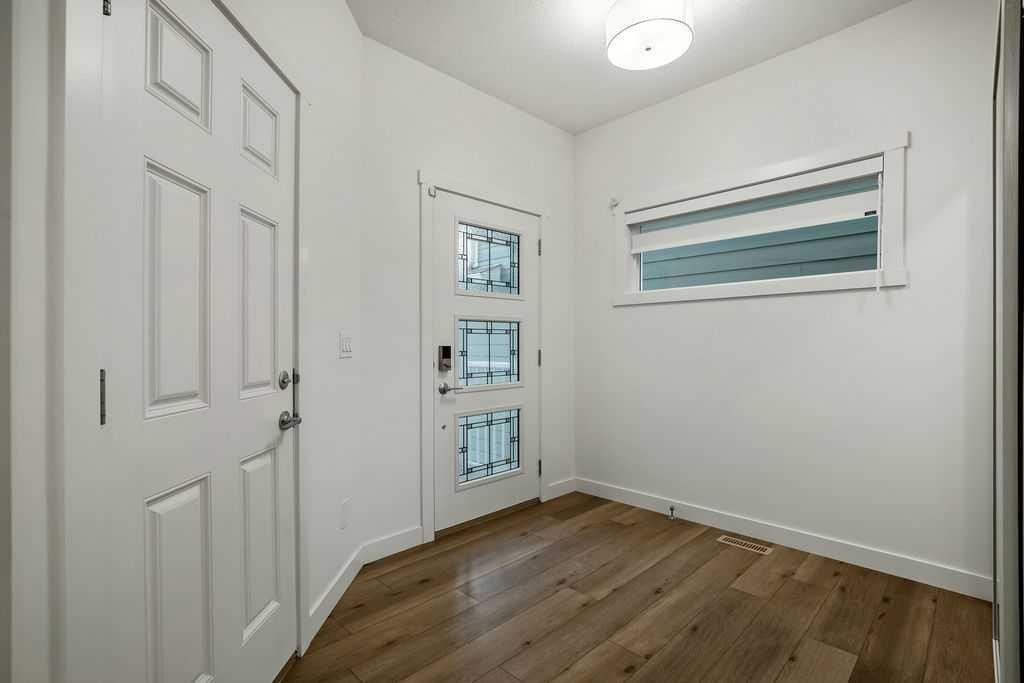 882 Bluerock Way Sw, Calgary, AB - Indoor Photo Showing Other Room