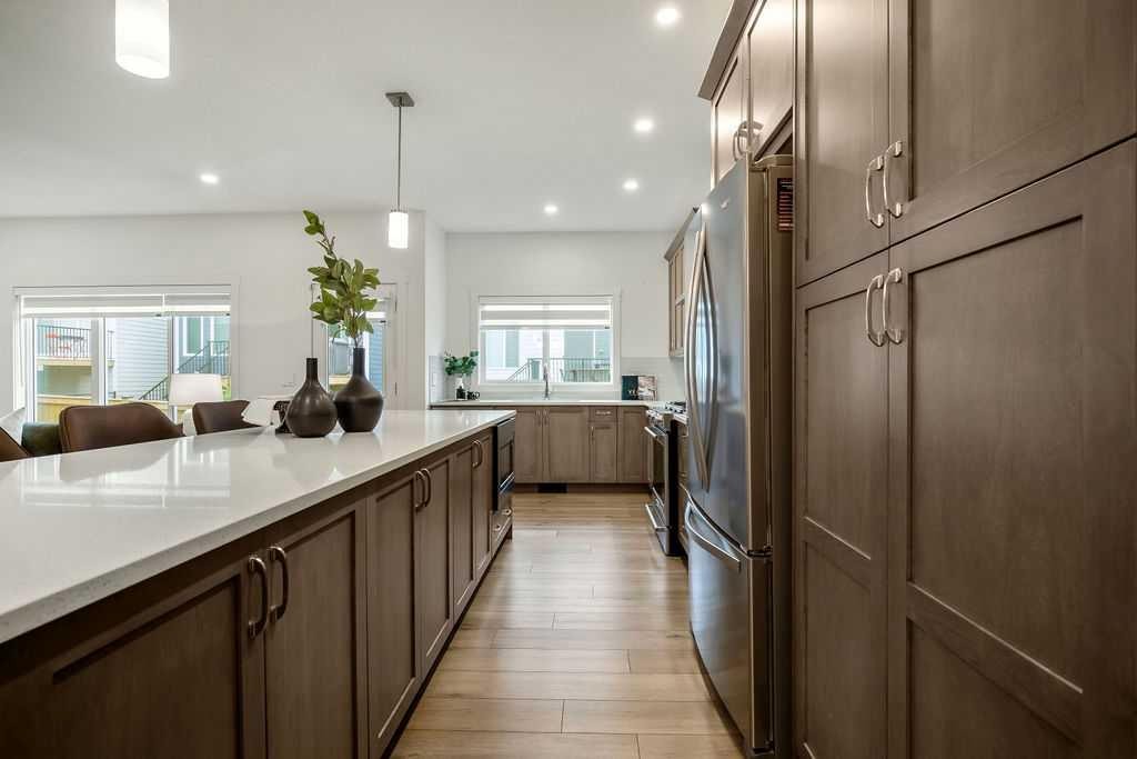 882 Bluerock Way Sw, Calgary, AB - Indoor Photo Showing Kitchen
