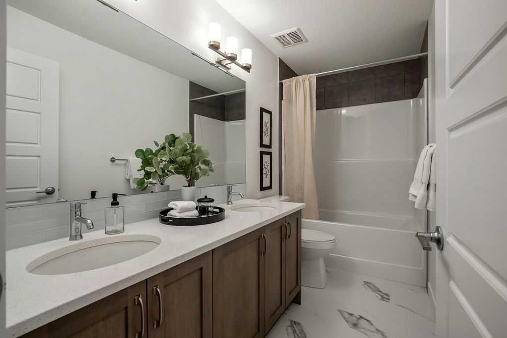 882 Bluerock Way Sw, Calgary, AB - Indoor Photo Showing Bathroom
