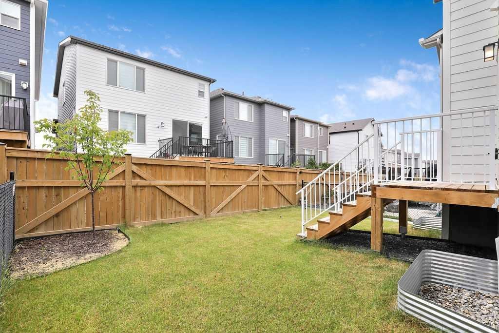882 Bluerock Way Sw, Calgary, AB - Outdoor