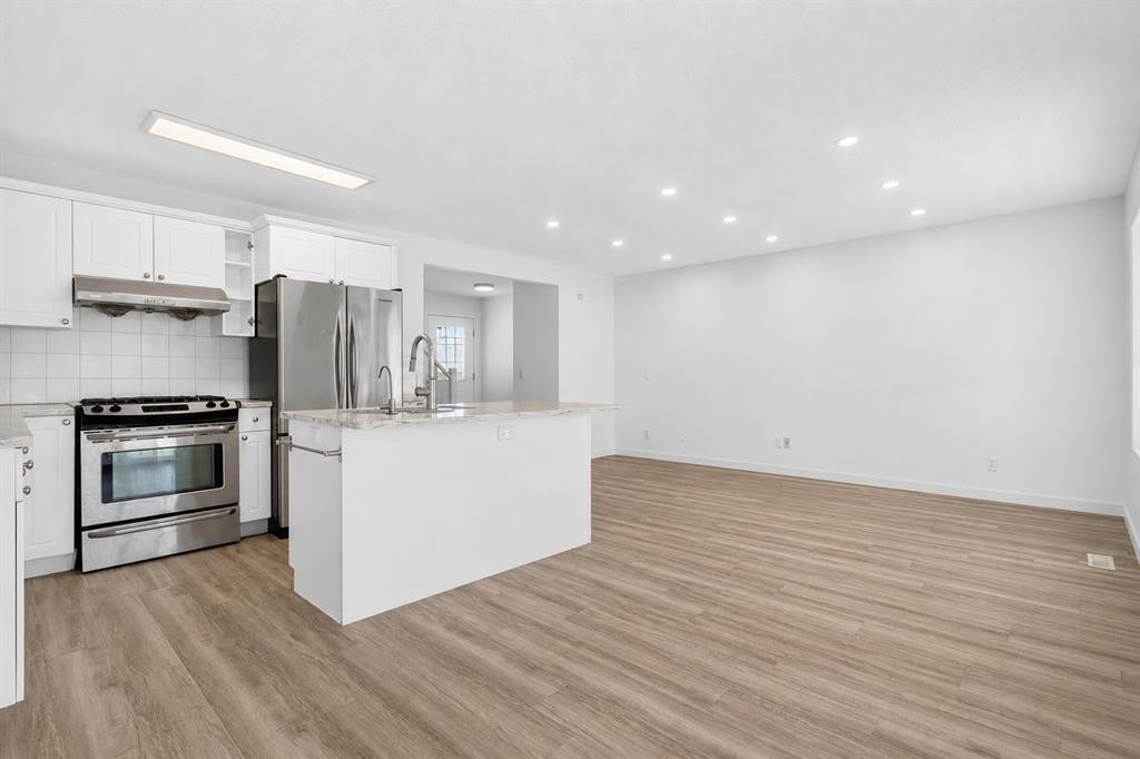 133 Martinvalley Crescent Ne, Calgary, AB - Indoor Photo Showing Kitchen With Upgraded Kitchen