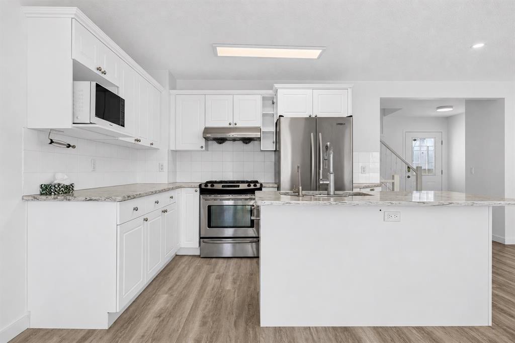 133 Martinvalley Crescent Ne, Calgary, AB - Indoor Photo Showing Kitchen With Upgraded Kitchen