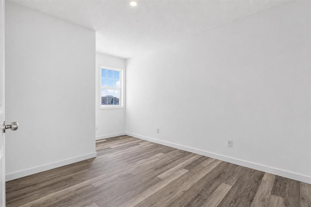 133 Martinvalley Crescent Ne, Calgary, AB - Indoor Photo Showing Other Room