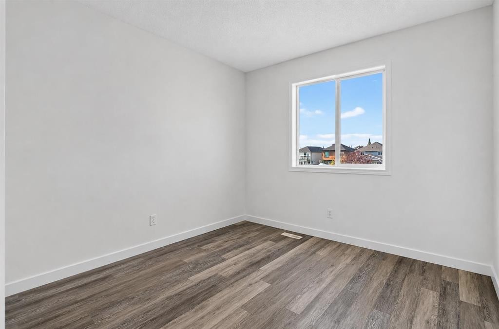 133 Martinvalley Crescent Ne, Calgary, AB - Indoor Photo Showing Other Room
