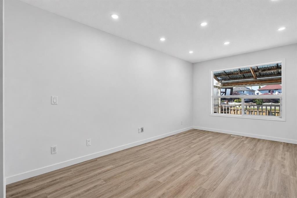 133 Martinvalley Crescent Ne, Calgary, AB - Indoor Photo Showing Other Room