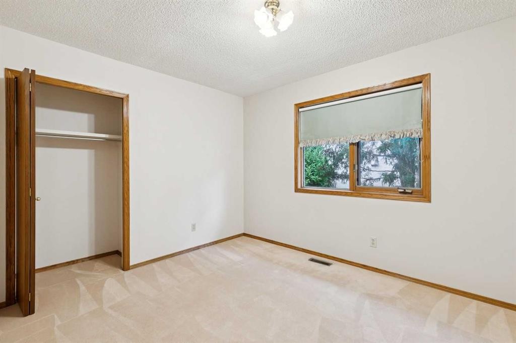 116 Scandia Rise Nw, Calgary, AB - Indoor Photo Showing Other Room
