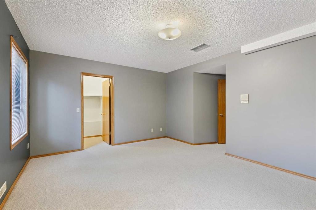 116 Scandia Rise Nw, Calgary, AB - Indoor Photo Showing Other Room