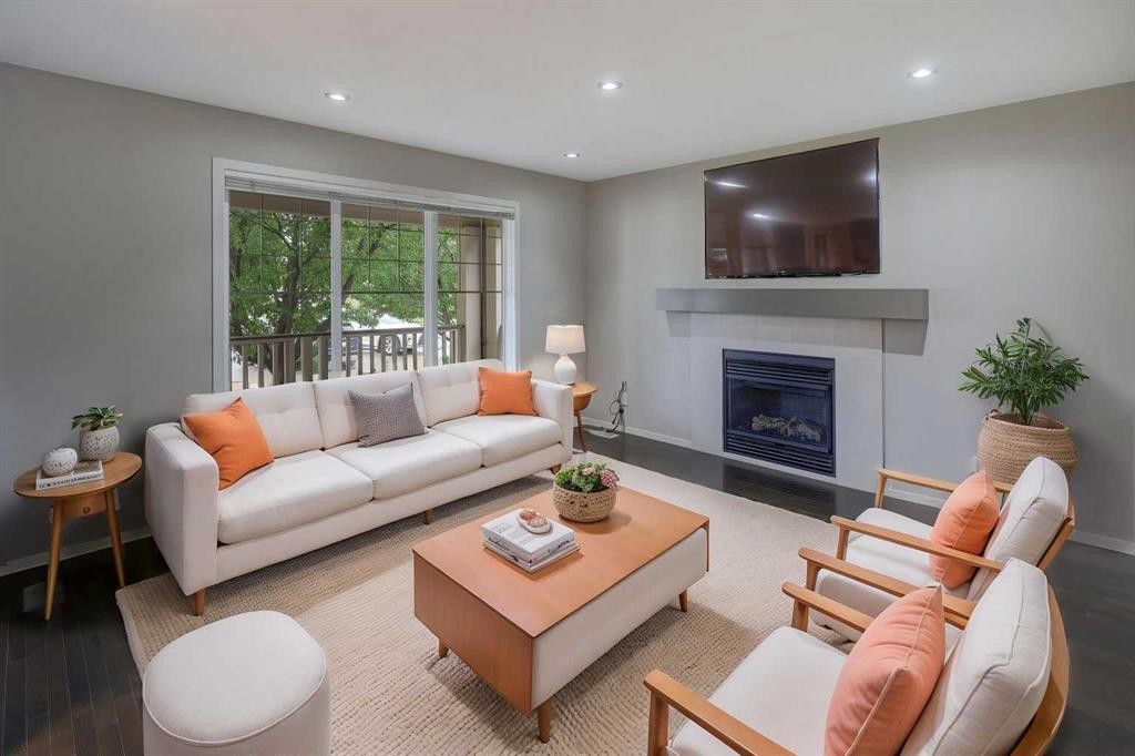 36 Copperstone Court Se, Calgary, AB - Indoor Photo Showing Living Room With Fireplace