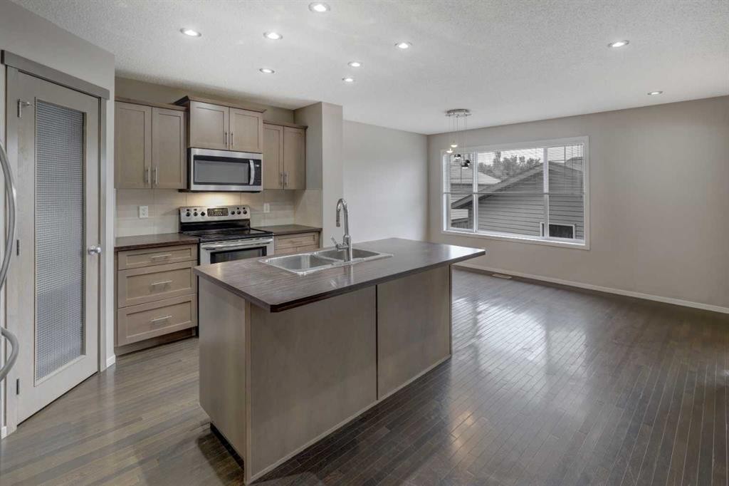 36 Copperstone Court Se, Calgary, AB - Indoor Photo Showing Kitchen With Double Sink With Upgraded Kitchen