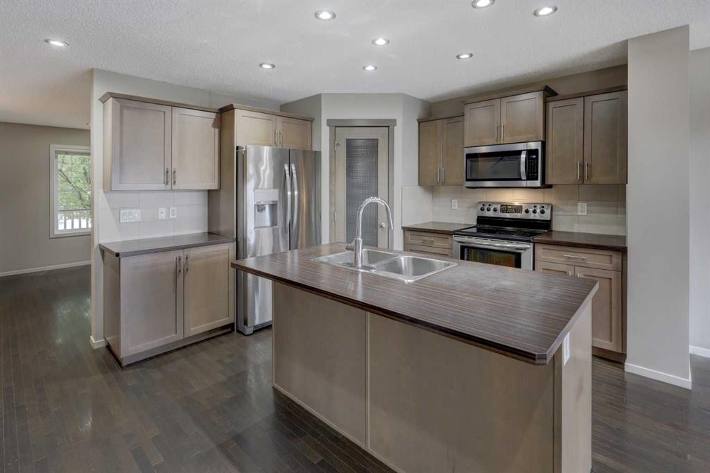 36 Copperstone Court Se, Calgary, AB - Indoor Photo Showing Kitchen With Double Sink