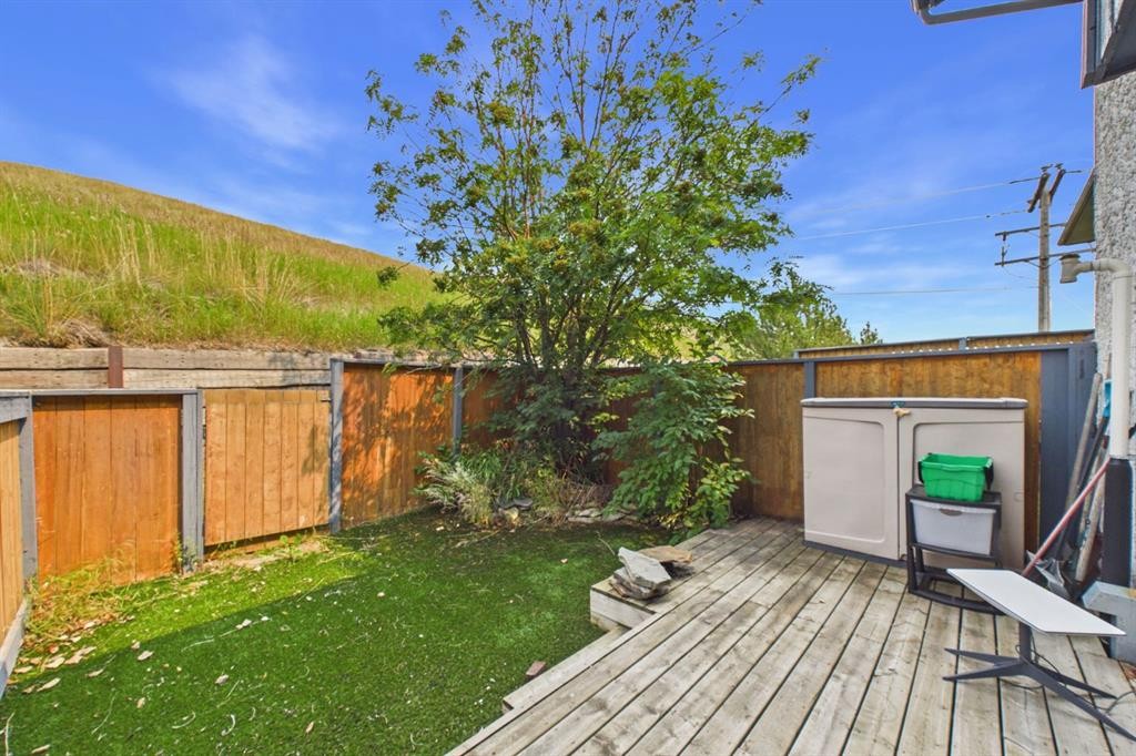 24-800 Bowcroft Place, Cochrane, AB - Outdoor With Deck Patio Veranda