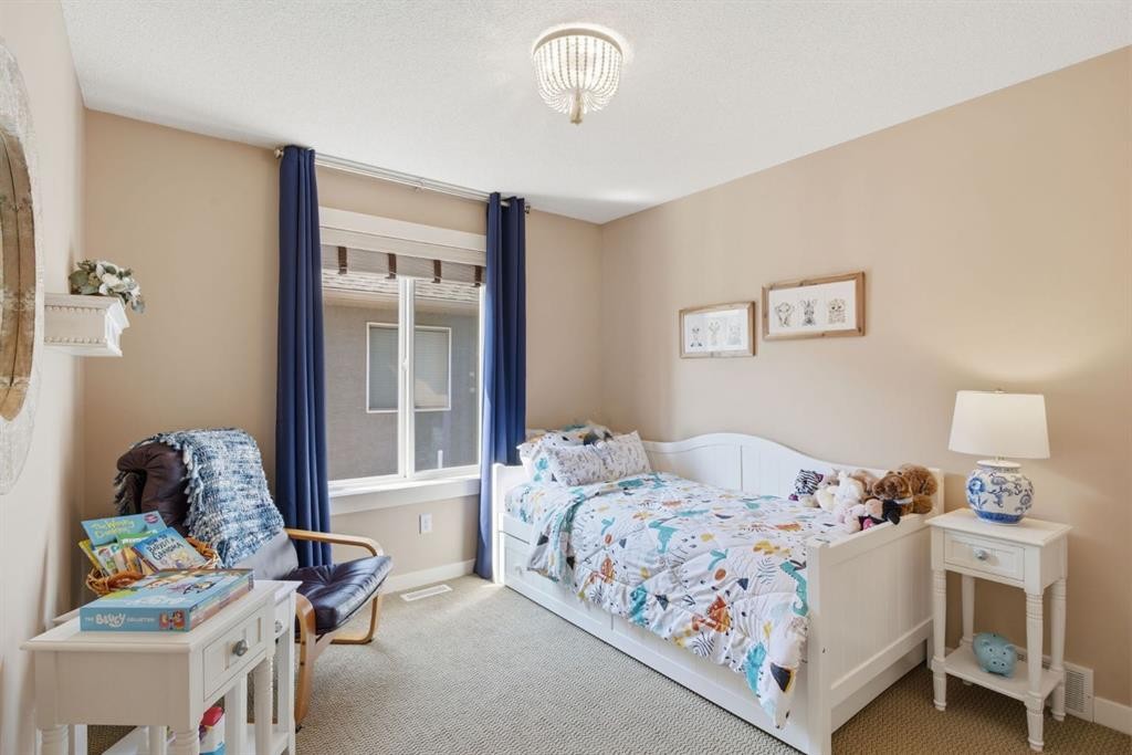 31 Chapala Close Se, Calgary, AB - Indoor Photo Showing Bedroom