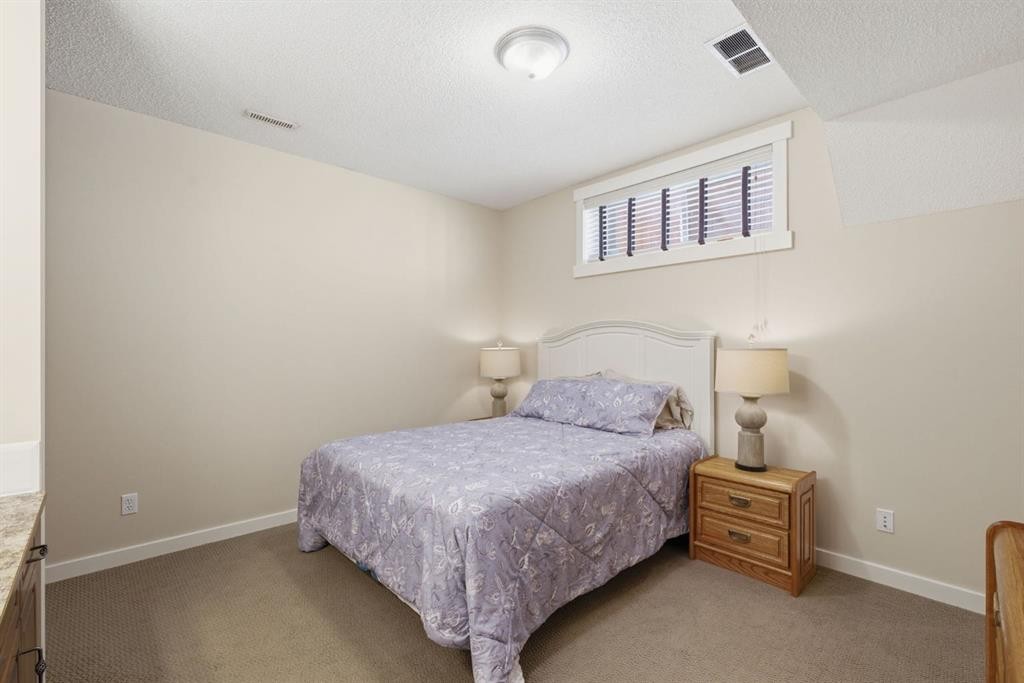 31 Chapala Close Se, Calgary, AB - Indoor Photo Showing Bedroom