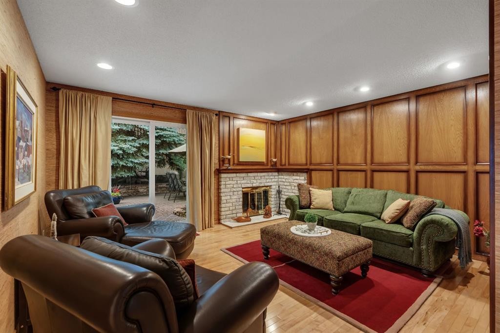 420 Strathcona Drive Sw, Calgary, AB - Indoor Photo Showing Living Room With Fireplace