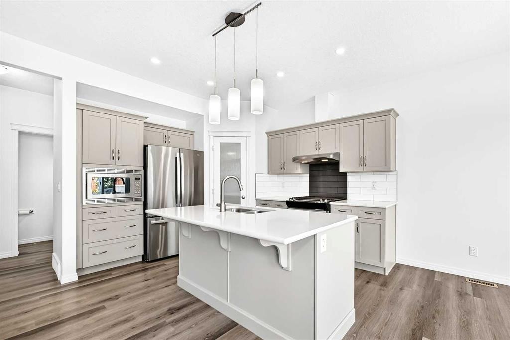 190 Sage Bluff Rise Nw, Calgary, AB - Indoor Photo Showing Kitchen With Stainless Steel Kitchen With Double Sink With Upgraded Kitchen
