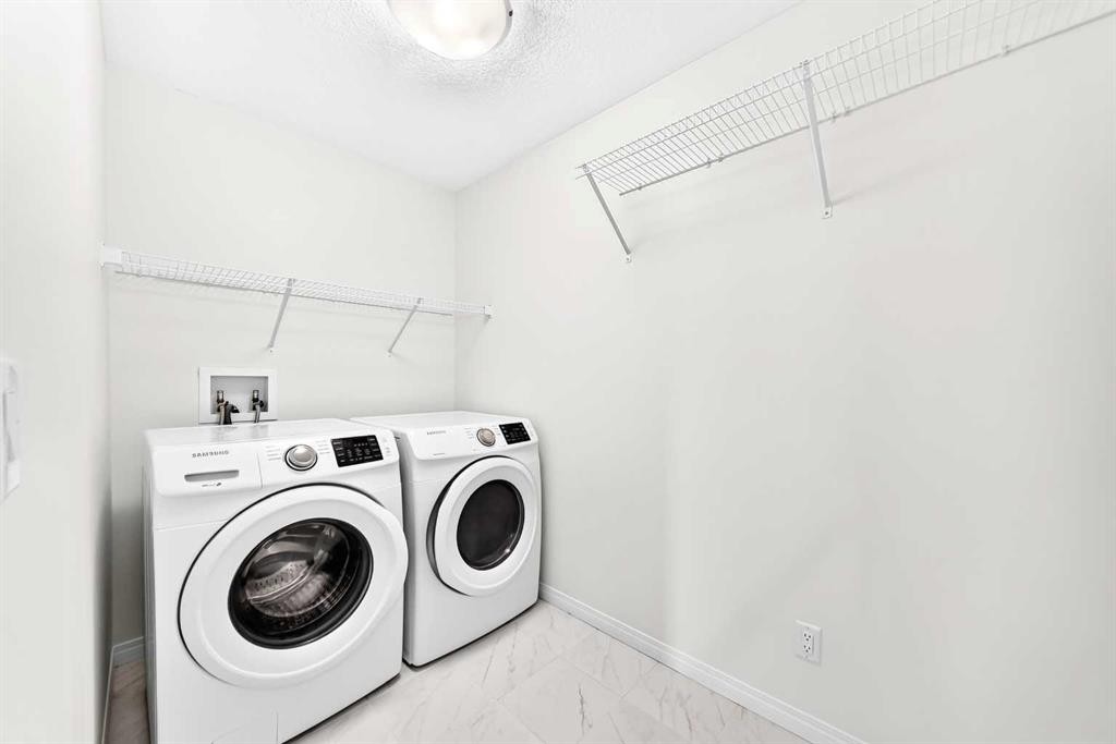 190 Sage Bluff Rise Nw, Calgary, AB - Indoor Photo Showing Laundry Room