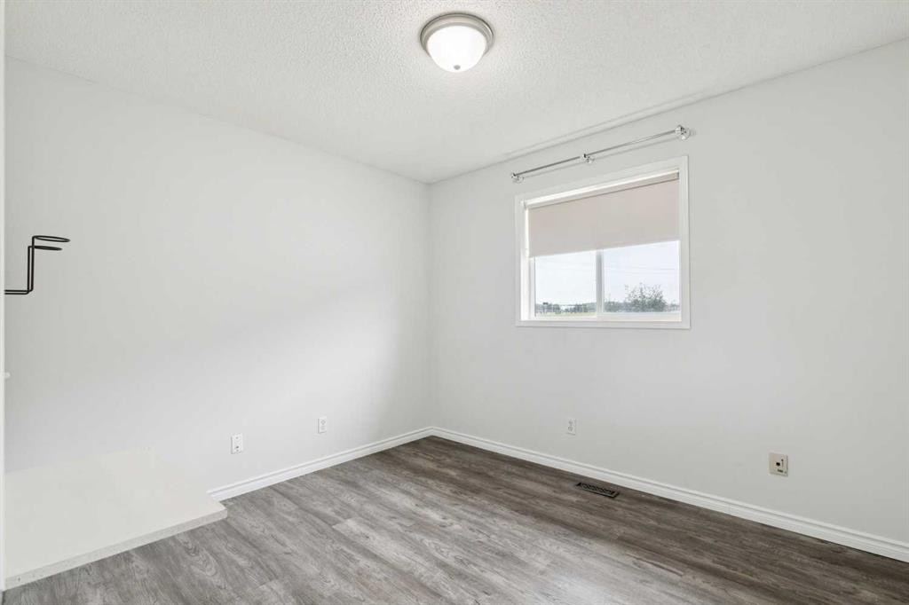 126 Somerglen Way Sw, Calgary, AB - Indoor Photo Showing Other Room