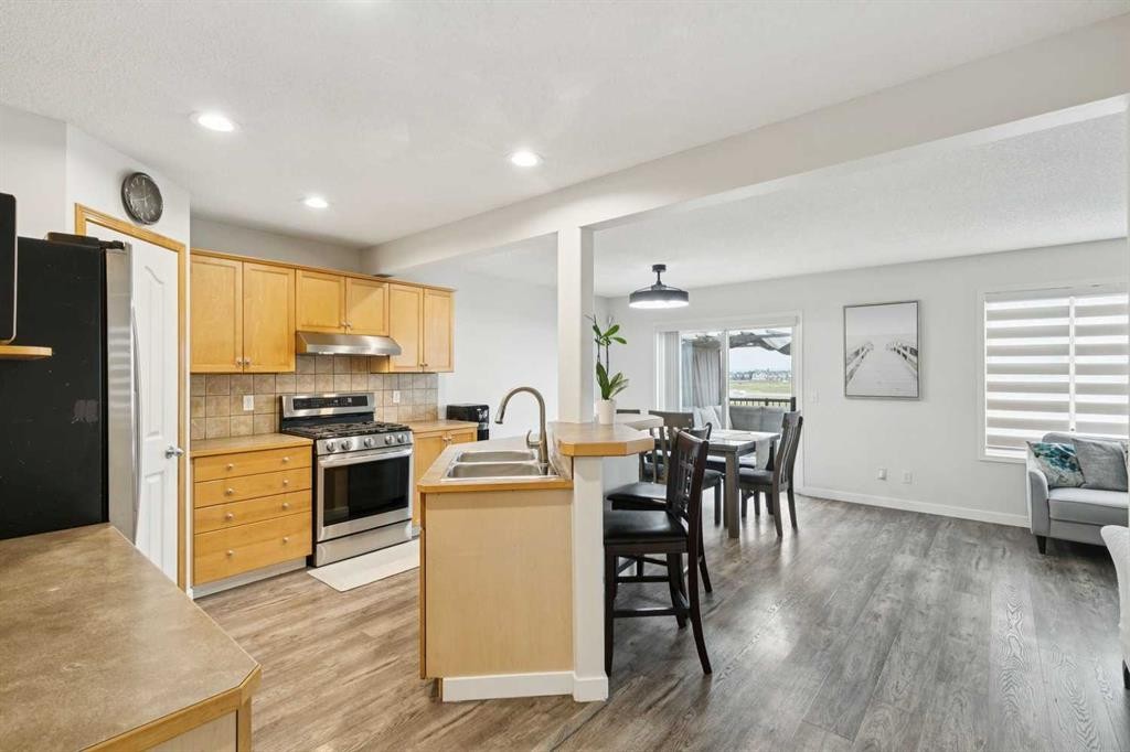 126 Somerglen Way Sw, Calgary, AB - Indoor Photo Showing Kitchen With Double Sink
