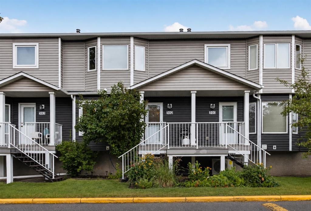 592 Regal Park Ne, Calgary, AB - Outdoor With Deck Patio Veranda With Facade