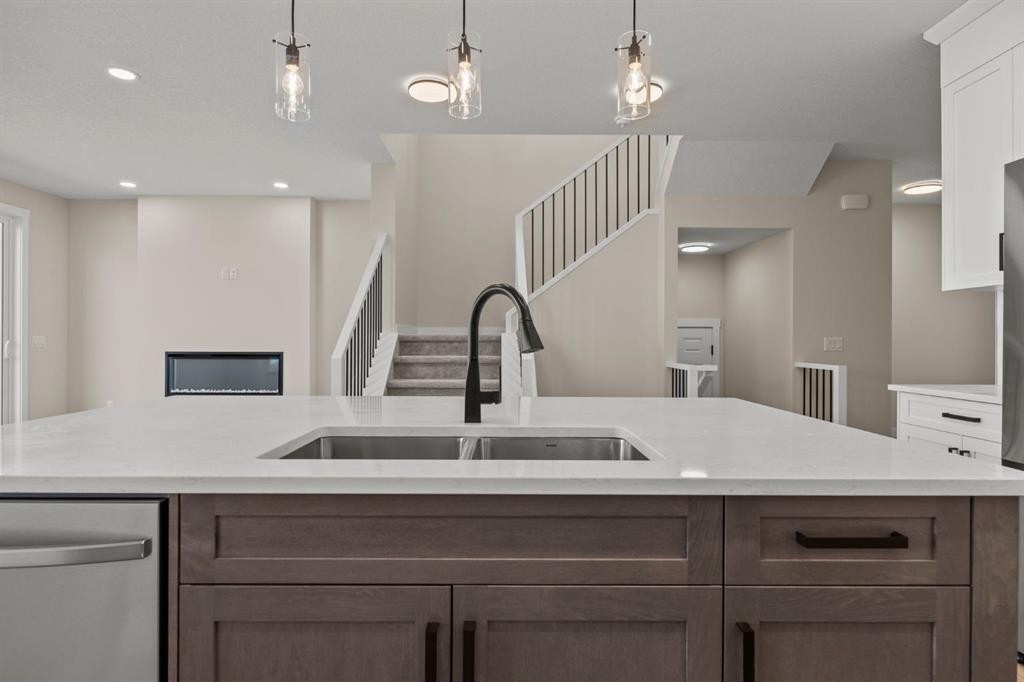 435 Kinniburgh Loop, Chestermere, AB - Indoor Photo Showing Kitchen With Double Sink