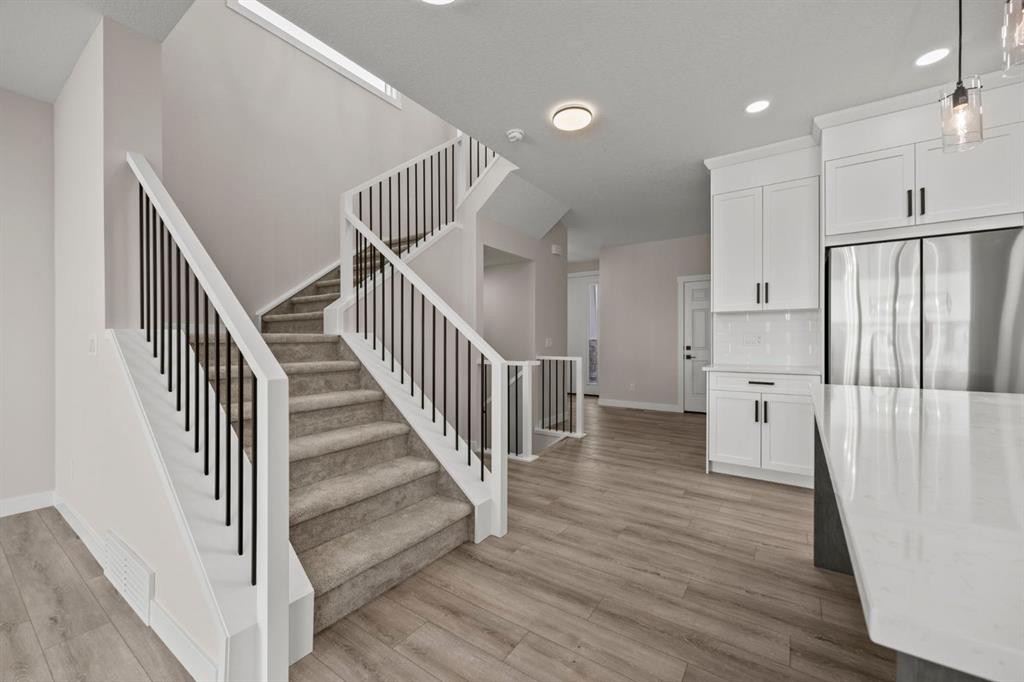 435 Kinniburgh Loop, Chestermere, AB - Indoor Photo Showing Other Room