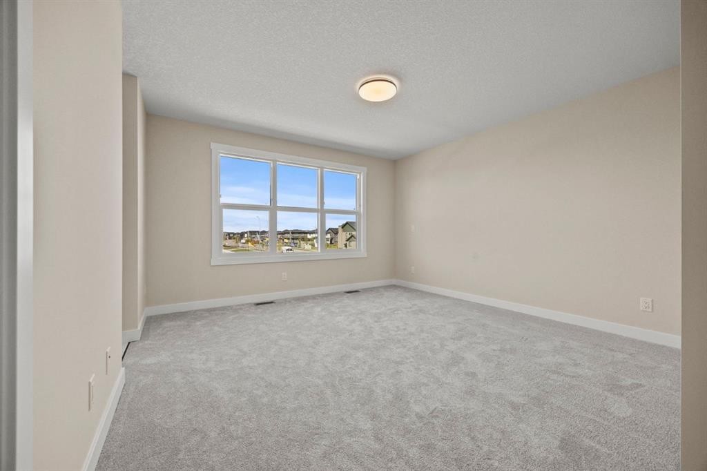 435 Kinniburgh Loop, Chestermere, AB - Indoor Photo Showing Other Room