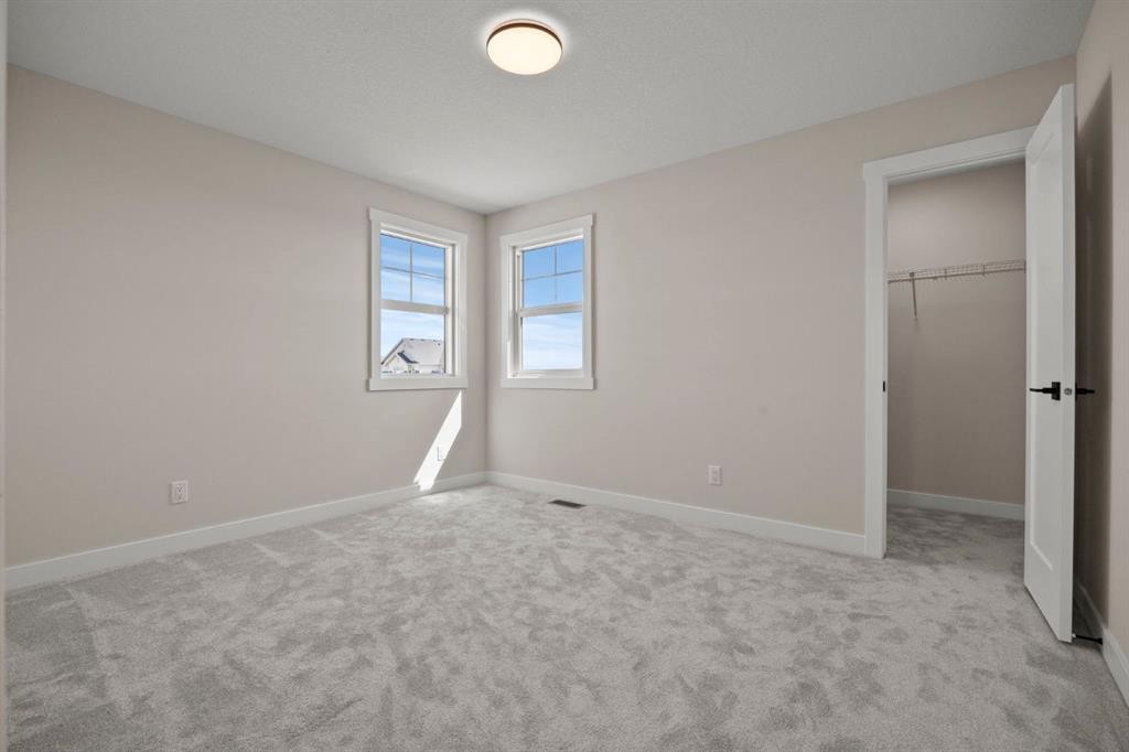 435 Kinniburgh Loop, Chestermere, AB - Indoor Photo Showing Other Room