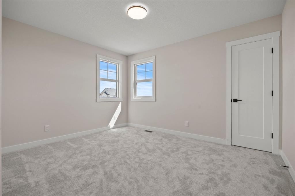 435 Kinniburgh Loop, Chestermere, AB - Indoor Photo Showing Other Room