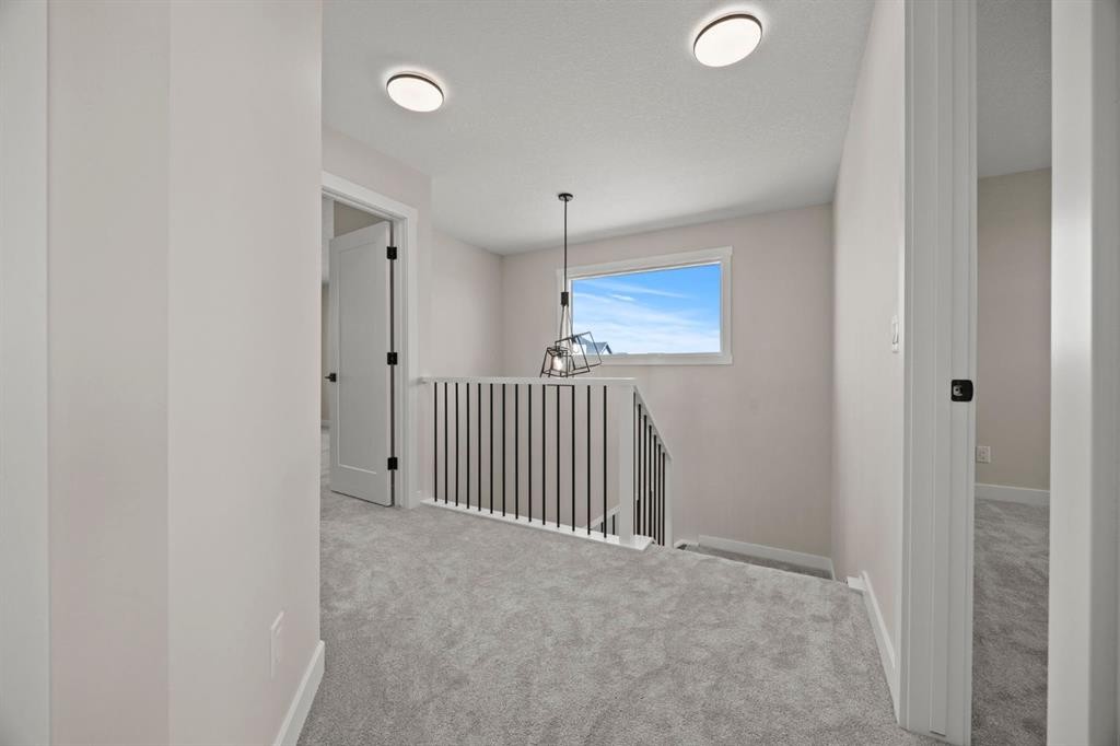 435 Kinniburgh Loop, Chestermere, AB - Indoor Photo Showing Other Room