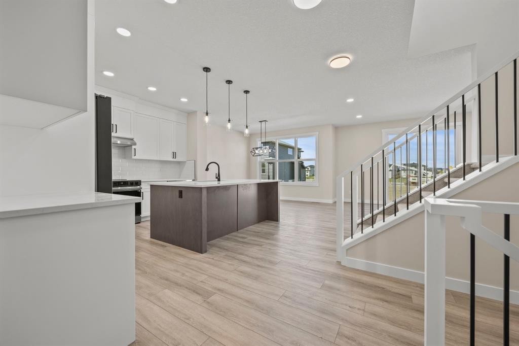 435 Kinniburgh Loop, Chestermere, AB - Indoor Photo Showing Kitchen With Upgraded Kitchen