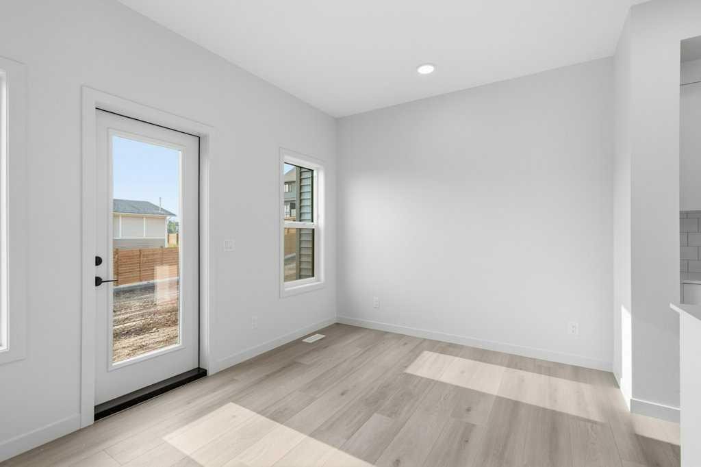 30 Heritage Heath, Cochrane, AB - Indoor Photo Showing Other Room