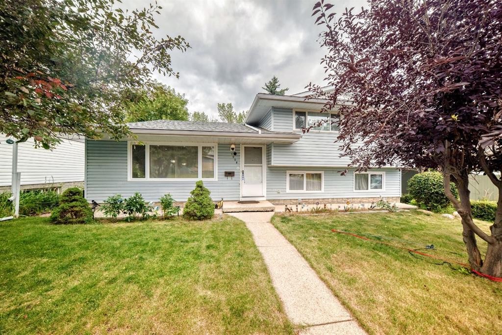 1008 Cantabrian Drive Sw, Calgary, AB - Outdoor With Facade