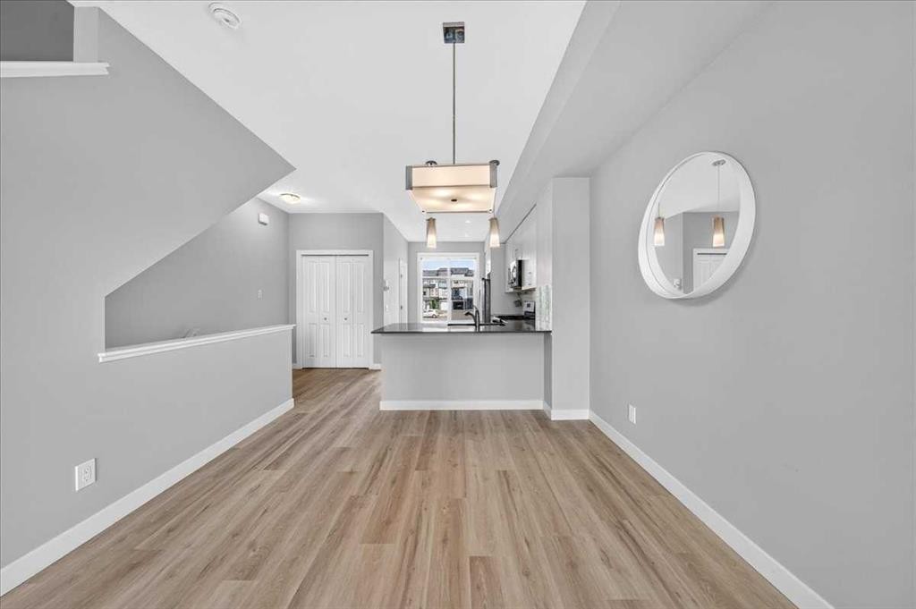 154 Seton Passage Se, Calgary, AB - Indoor Photo Showing Other Room