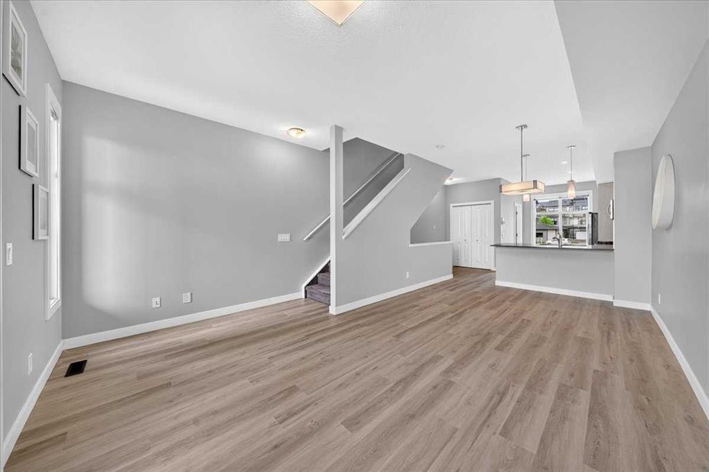 154 Seton Passage Se, Calgary, AB - Indoor Photo Showing Other Room