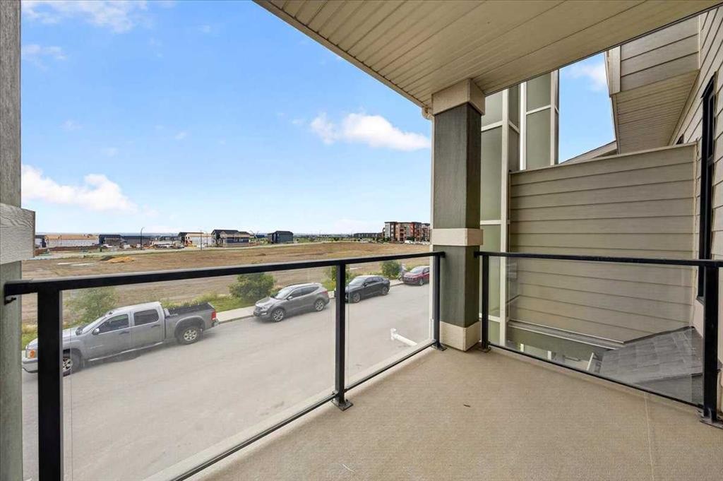 154 Seton Passage Se, Calgary, AB - Outdoor With Balcony With Exterior