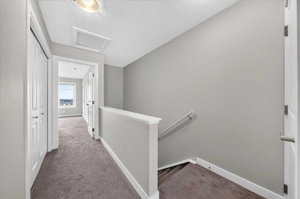 154 Seton Passage Se, Calgary, AB - Indoor Photo Showing Other Room