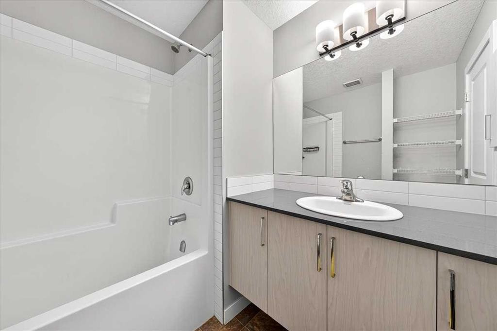 154 Seton Passage Se, Calgary, AB - Indoor Photo Showing Bathroom
