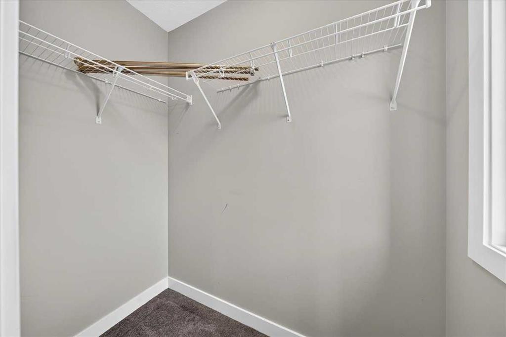 154 Seton Passage Se, Calgary, AB - Indoor With Storage