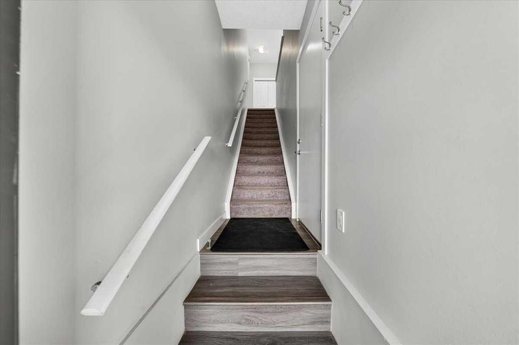 154 Seton Passage Se, Calgary, AB - Indoor Photo Showing Other Room