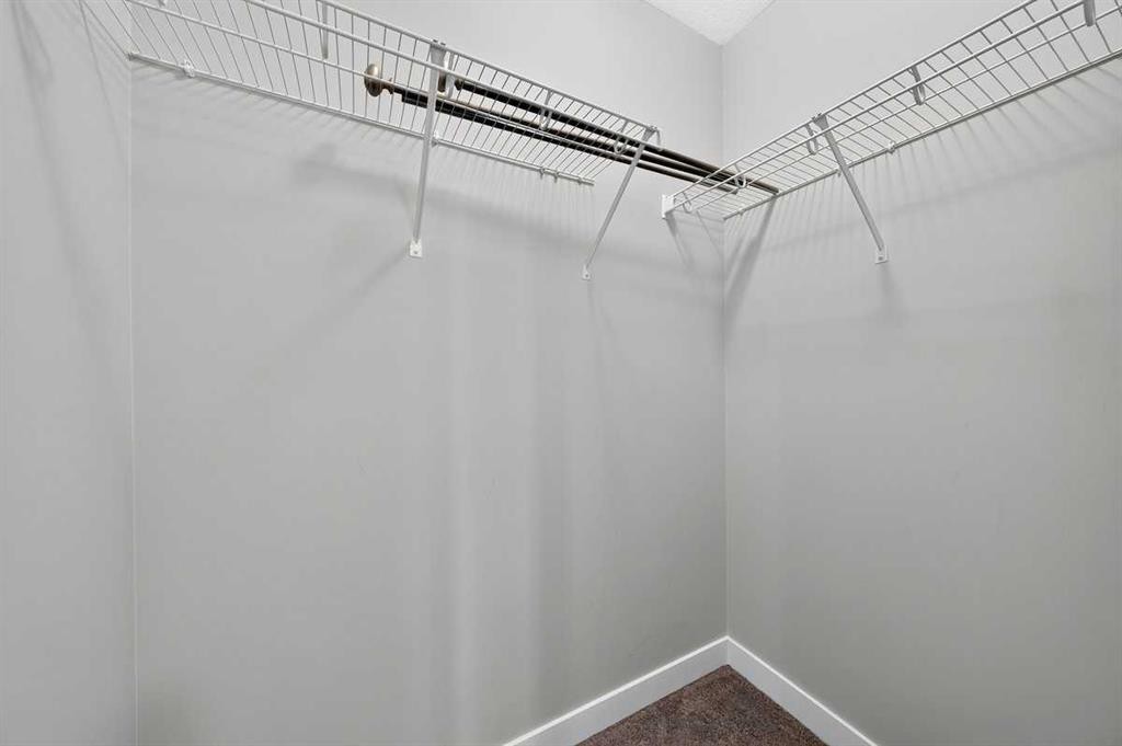 154 Seton Passage Se, Calgary, AB - Indoor With Storage