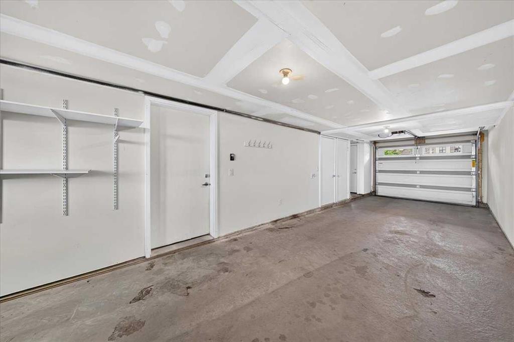 154 Seton Passage Se, Calgary, AB - Indoor Photo Showing Garage