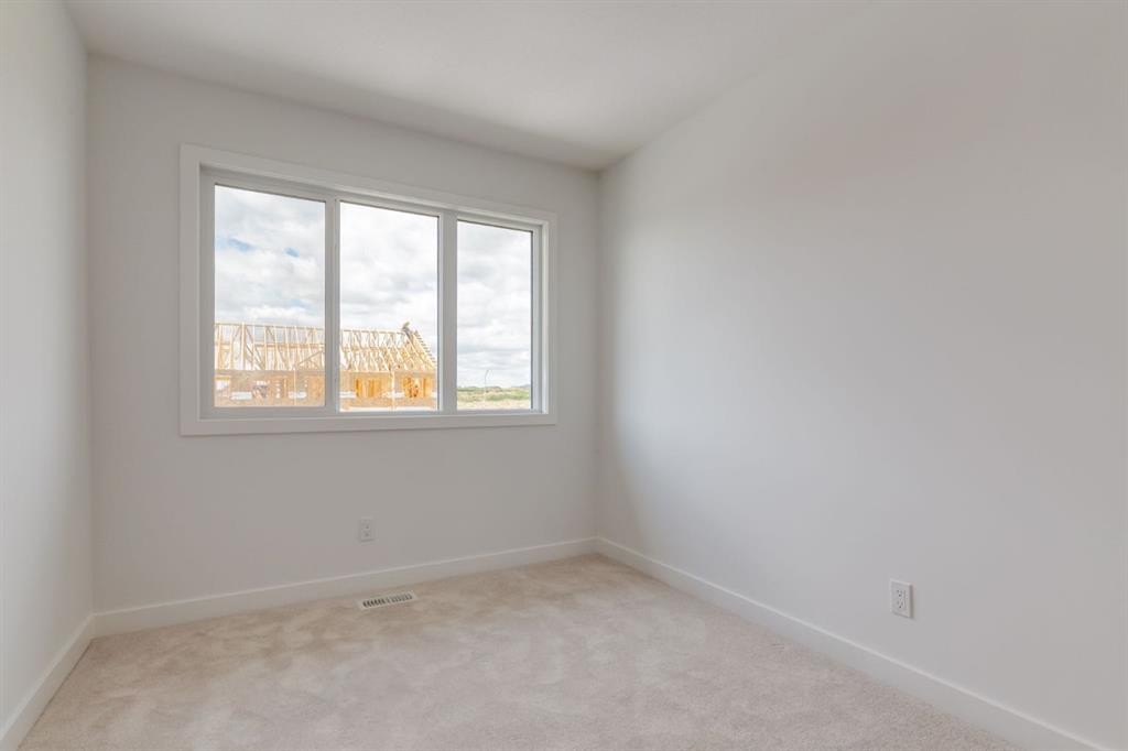 704 Sora Boulevard Se, Calgary, AB - Indoor Photo Showing Other Room