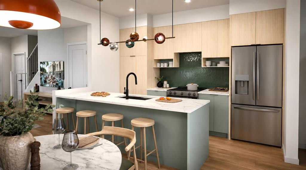 704 Sora Boulevard Se, Calgary, AB - Indoor Photo Showing Kitchen With Upgraded Kitchen